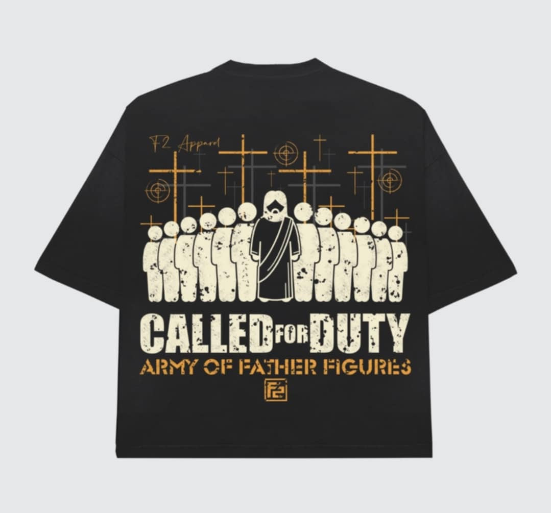 Black t-shirt featuring a bold graphic of stylized figures standing together with crosses in the background and the phrase ‘Called for Duty: Army of Father Figures.’ Symbolizes faith, strength, and leadership among fathers.