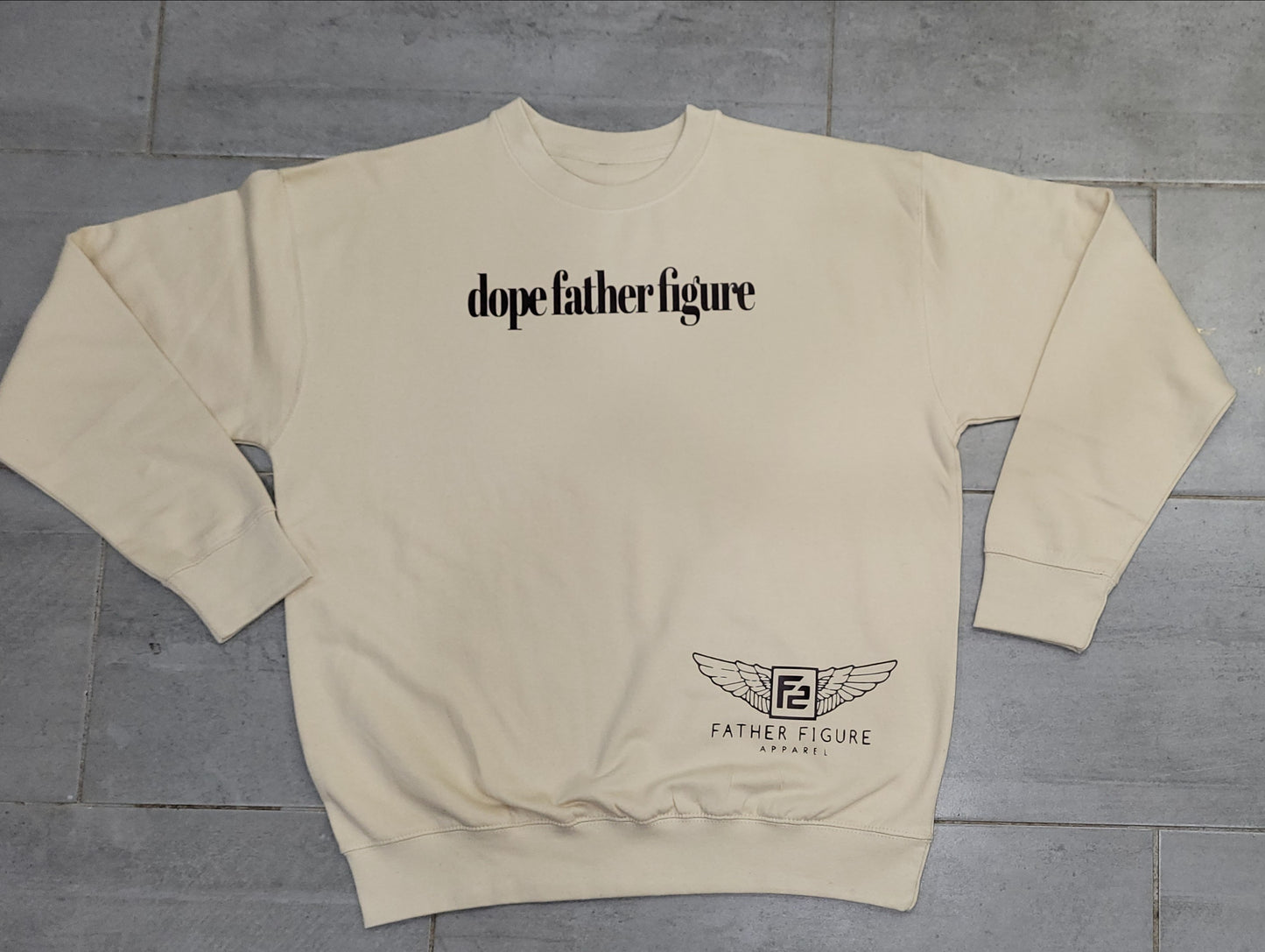 Cozy ivory cream sweatshirt with elegant chocolate script and a subtle F2 wing logo, perfect for fall and winter style.