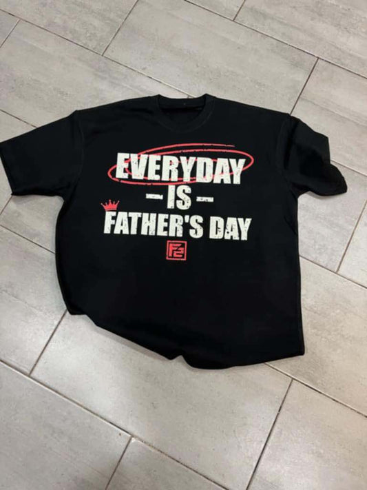 A black t-shirt with the text 'EVERYDAY IS FATHER'S DAY' printed in bold red and white letters.