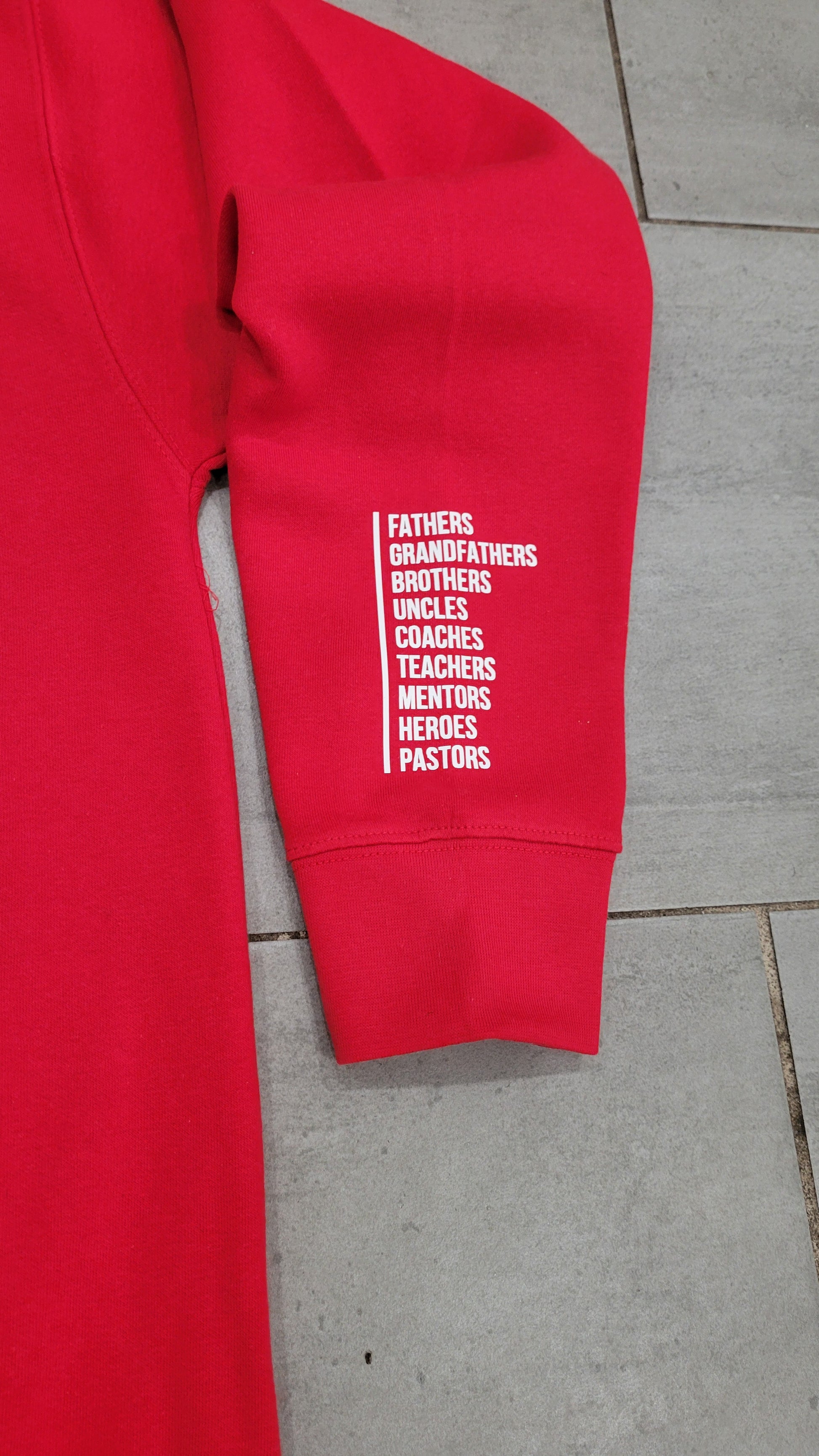 Cozy gray vintage sweatshirt showcasing a nostalgic design with four men and bold 'Father Figure' text.