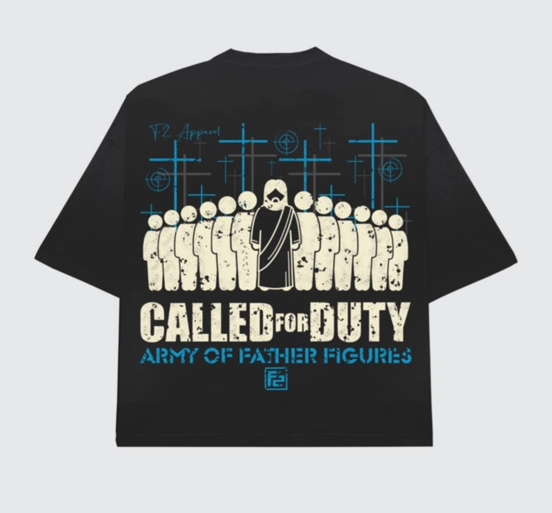 Black t-shirt featuring a bold graphic of stylized figures standing together with crosses in the background and the phrase ‘Called for Duty: Army of Father Figures.’ Symbolizes faith, strength, and leadership among fathers.