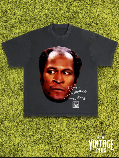 Retro graphic tee featuring a bold vintage James Evans big face design, ideal for TV fans and streetwear enthusiasts.