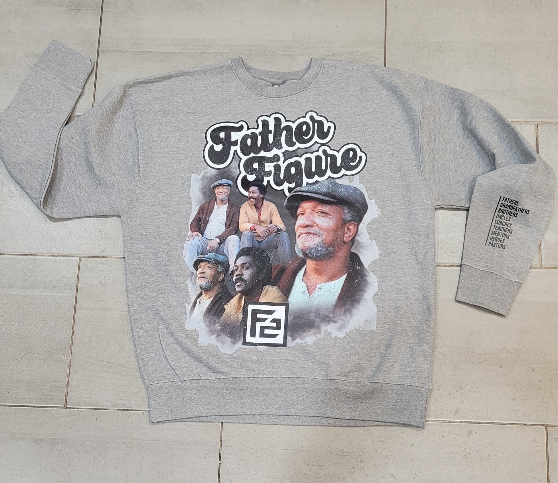 Cozy gray vintage sweatshirt showcasing a nostalgic 'Father Figure' design with four men in classic style.