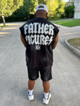 Owner, Reggie George wearing a black sleeveless jacket with 'FATHER FIGURES' text on the back, standing outdoors.
