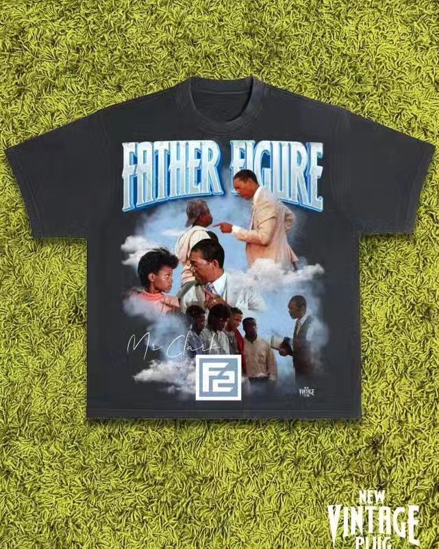 Soft, vintage-washed dark grey F2 "Vintage" tee with a retro Father Figures design, perfect for casual, nostalgic style.