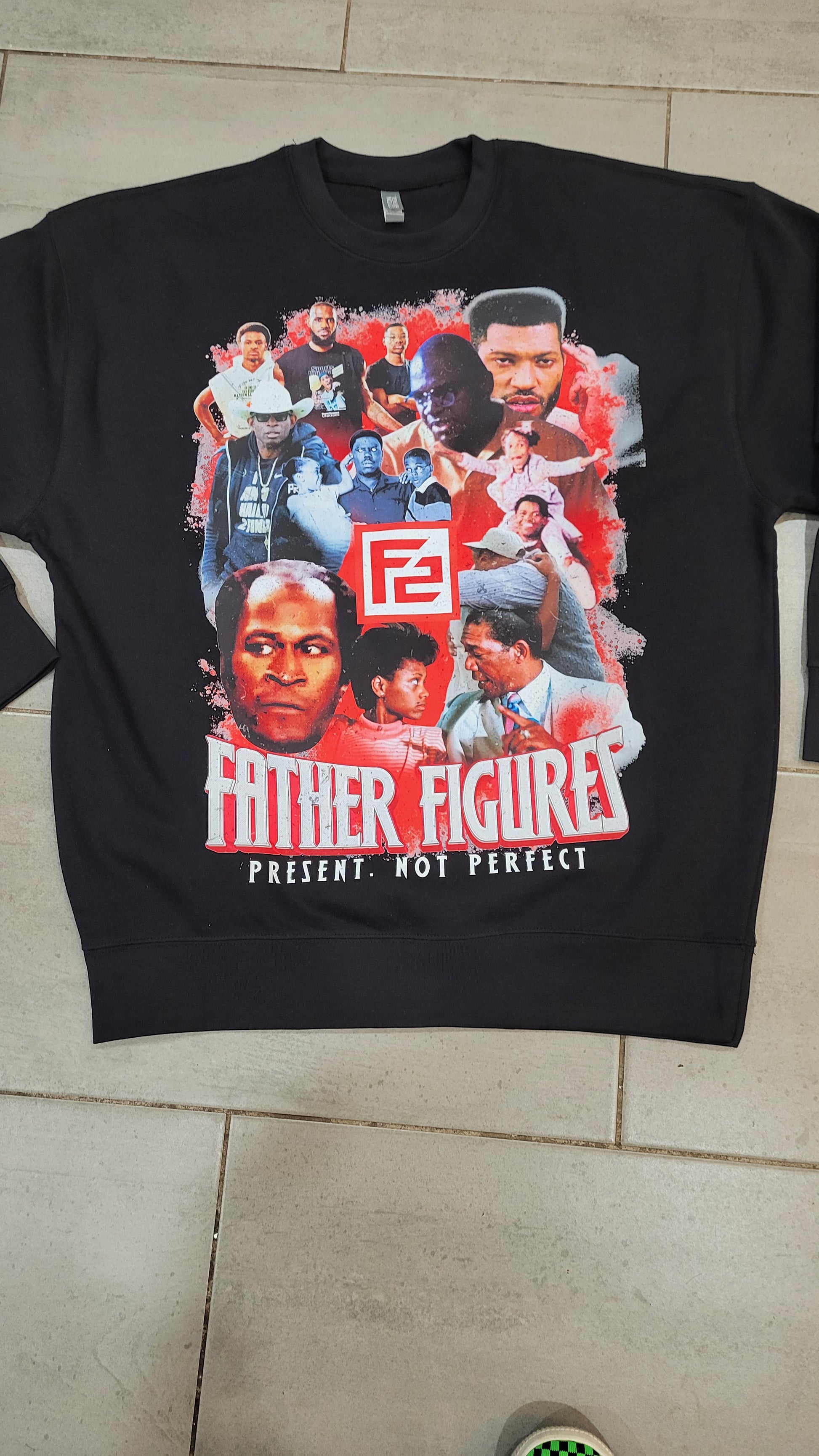 Cozy gray vintage sweatshirt showcasing a nostalgic 'Father Figure' design with four men in a retro graphic style.