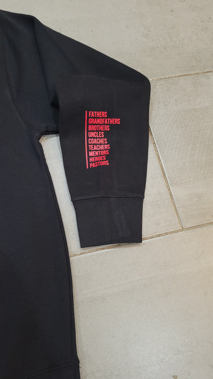 Cozy gray vintage sweatshirt with a nostalgic 'Father Figure' graphic showcasing four men in retro style.