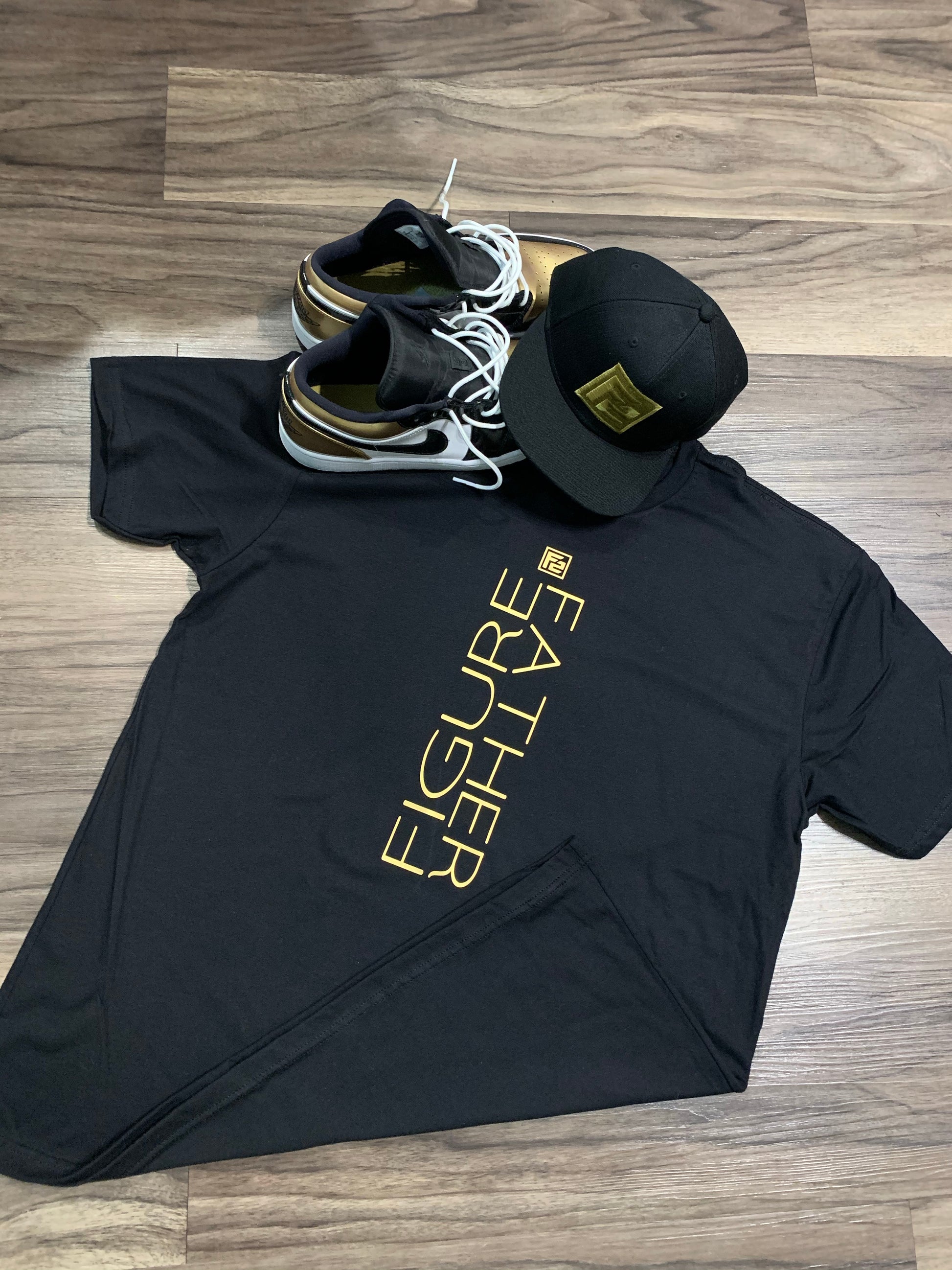 Stylish F2 Gold “Flip” Tee featuring a bold, unorthodox print on a comfortable crew neck design in vibrant gold tones.